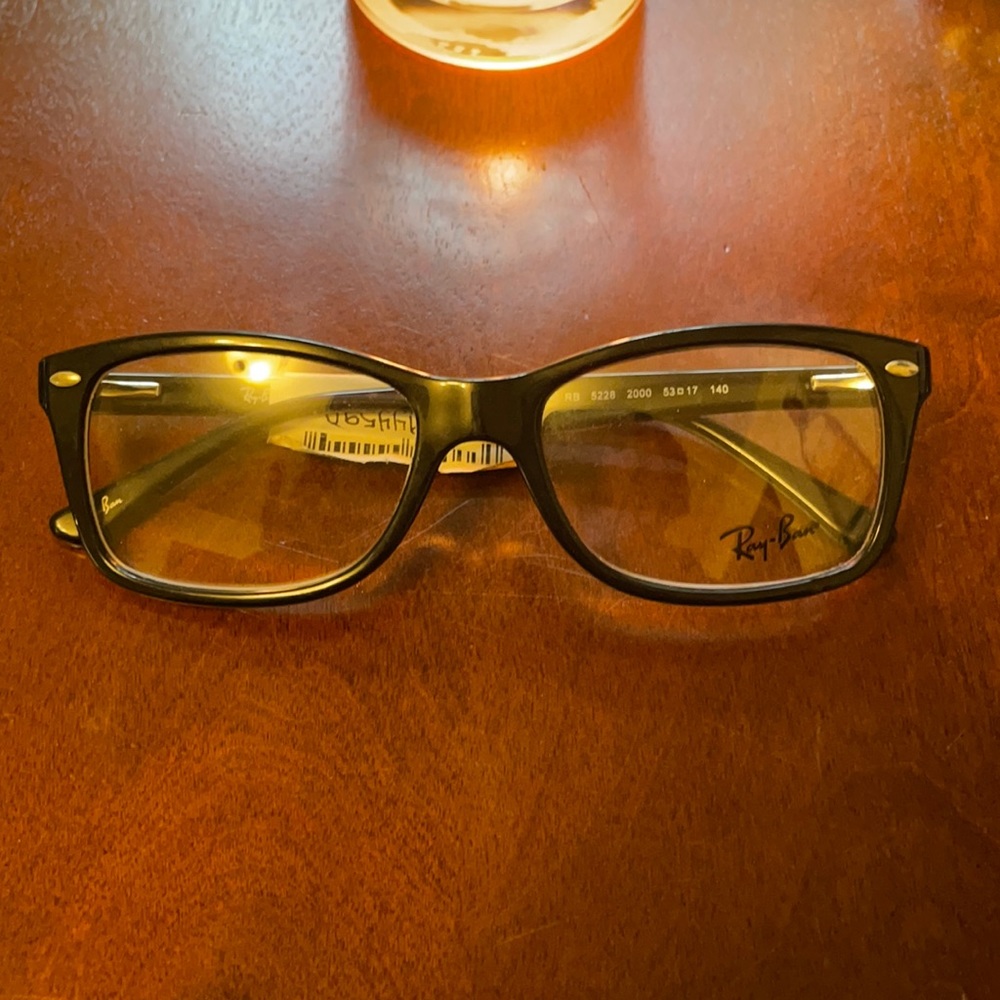 Ray•Ban glasses
